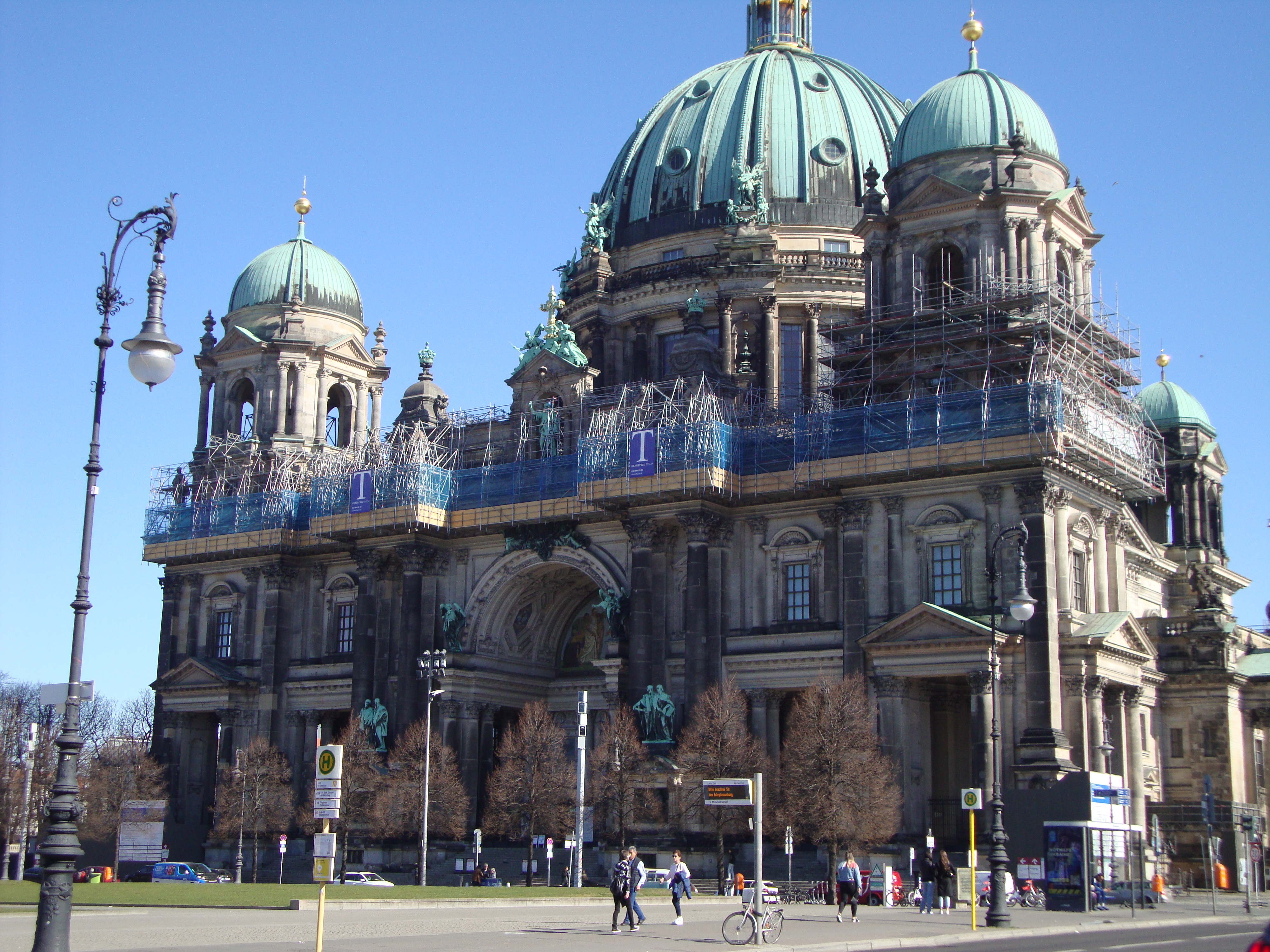  a large building with a dome roof with Berlin Cathedral in the background