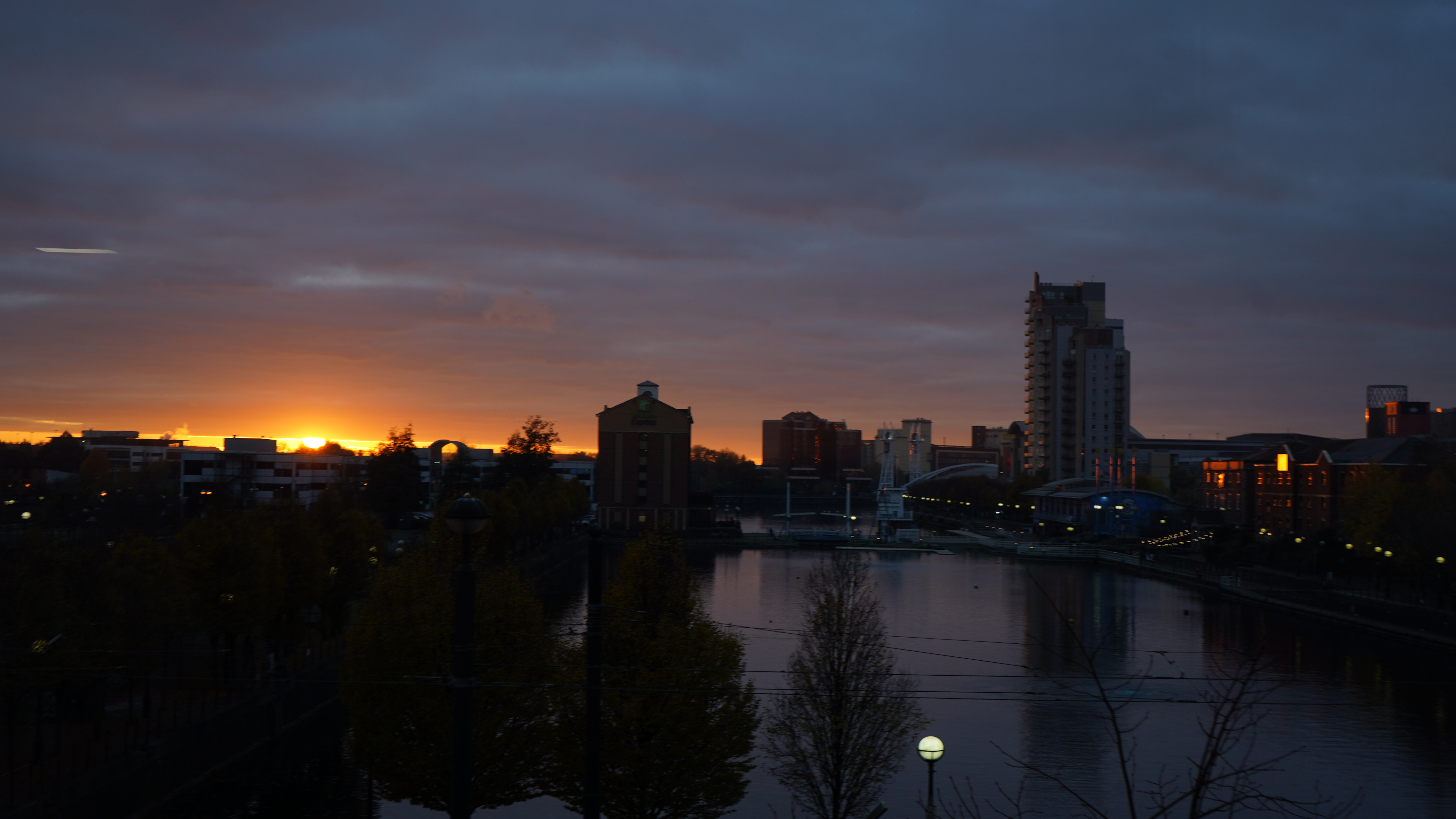  a city skyline at sunset