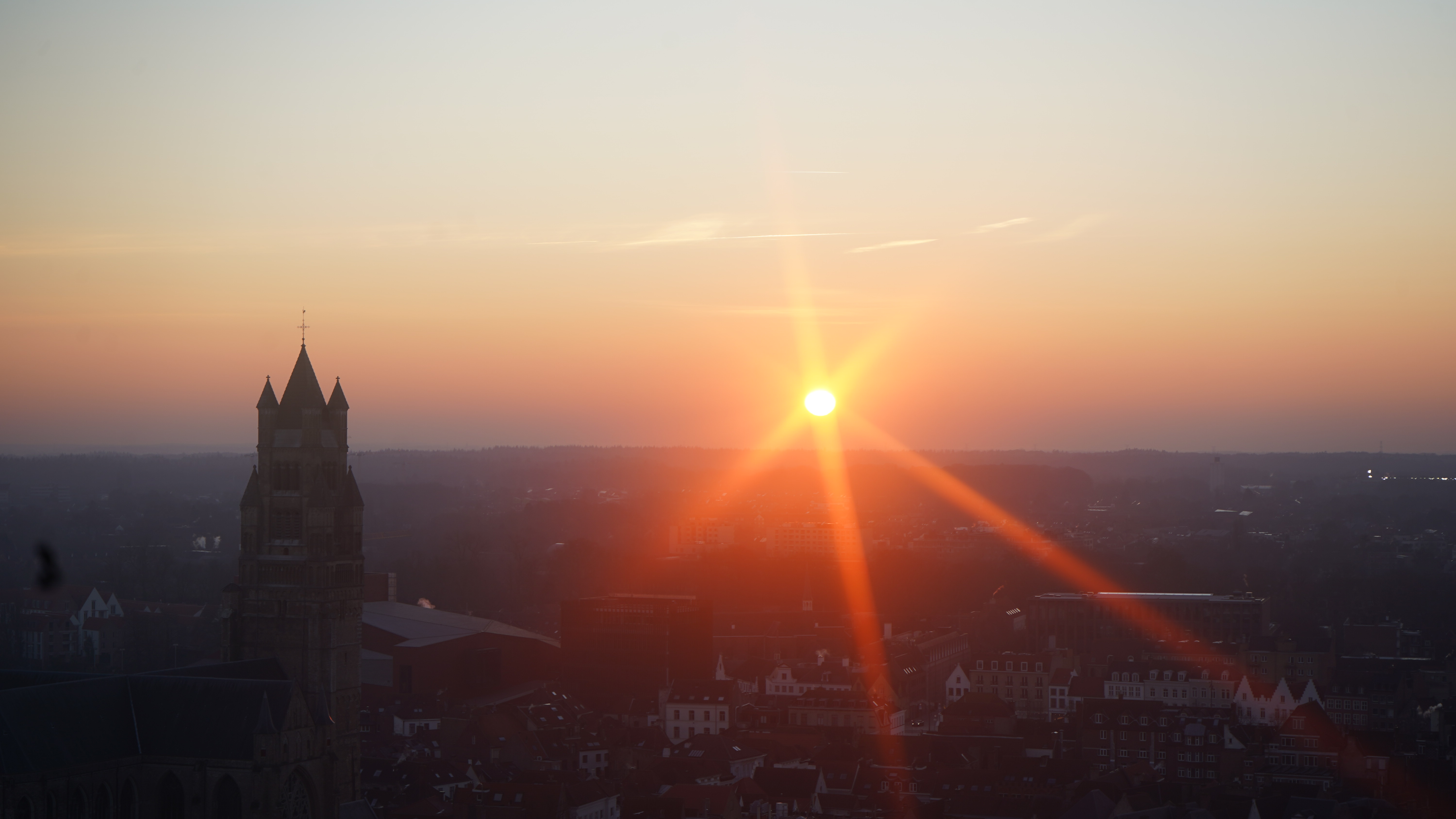  a sunset over a city